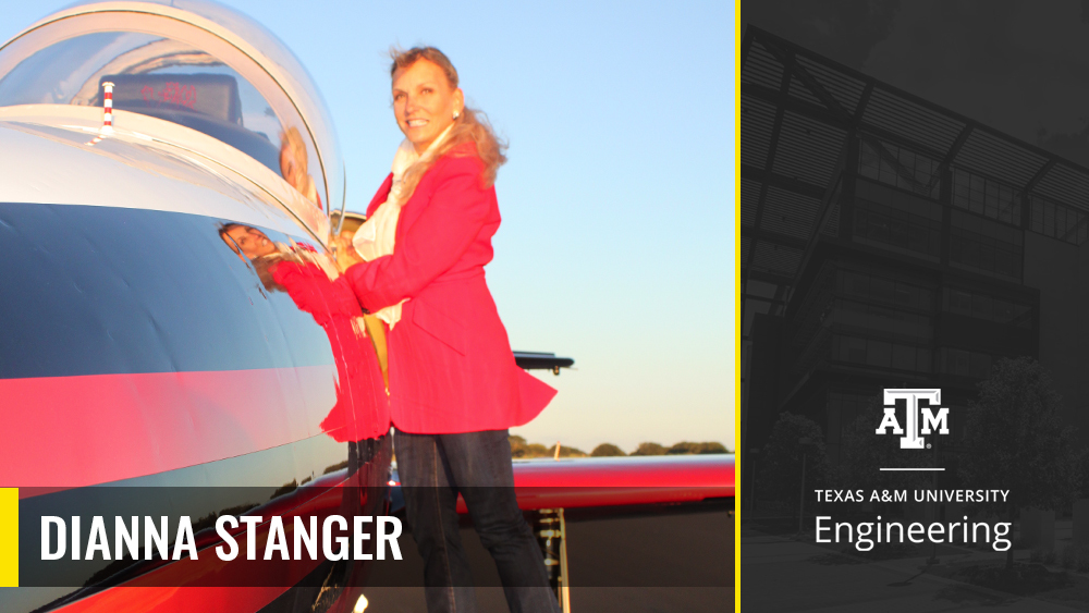 Dianna Stanger posing for a photo next to an airplane.
