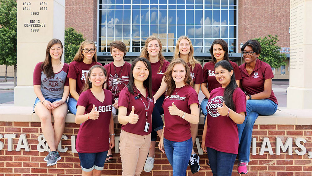 A group of female engineering students pose for a photo