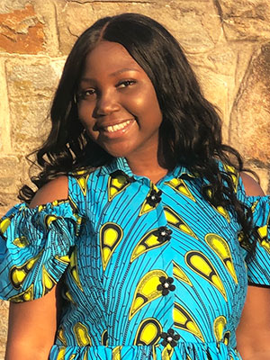 Rayo Adebowale smiling.